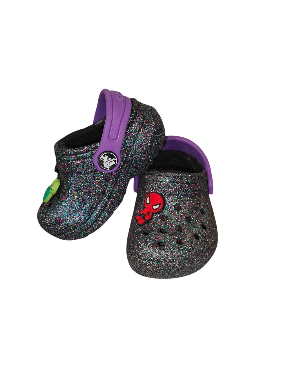 Crocs Classic Lined Glitter Clogs in a black multi-color glitter finish 4c